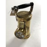 A vintage brass 'The Ceag' inspection lamp