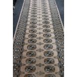 A Tekke design runner on brown ground,