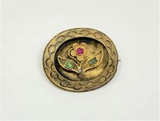 A 15ct gold ruby and emerald antique brooch, 9.4g.