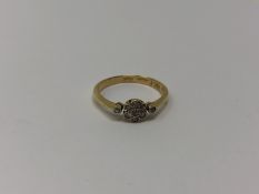An antique 18ct gold floral cluster ring, 2.6g.