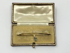 An Art Nouveau 15ct gold and aquamarine brooch, 3.4g, boxed.
