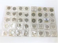 A collection of George V and Elizabeth II half crowns, including uncirculated examples,