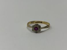 An antique 18ct gold ruby and diamond ring