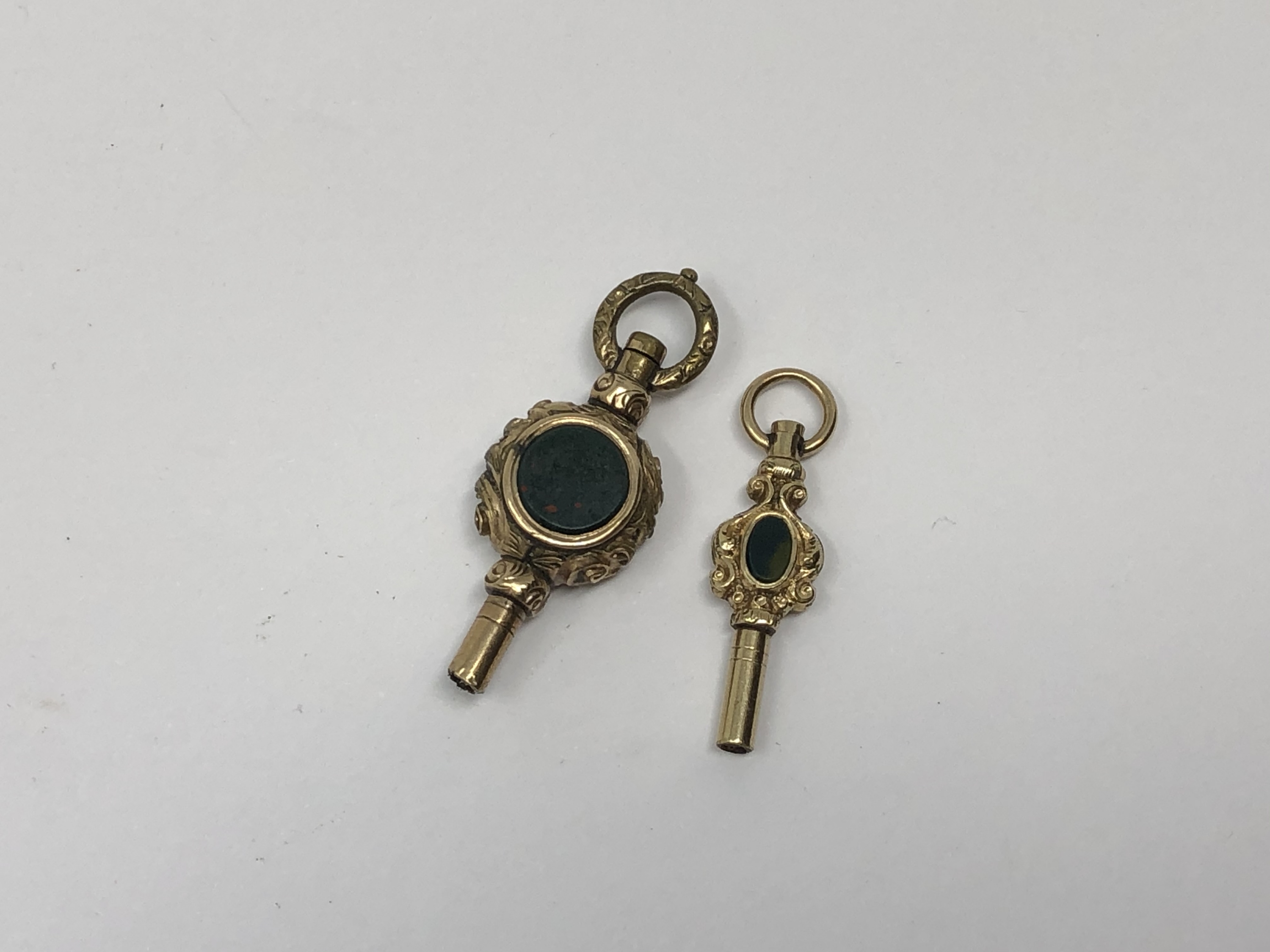 Two antique gold watch keys (2)