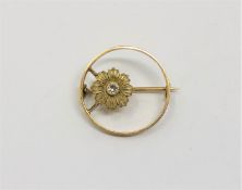 A 15ct gold diamond brooch, 3.4g.