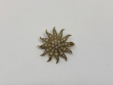 A 15ct gold pearl star brooch, 4.85g.