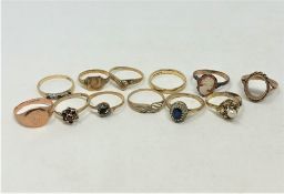 A collection of twelve 9ct gold rings, 21.1g, some set with stones.