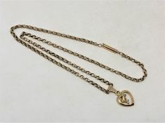 A 9ct gold chain with heart shaped pendant, 5.9g.