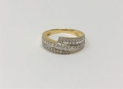 An 18ct gold gold diamond set ring,