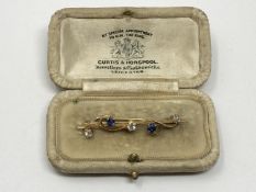 A 15ct gold antique diamond and sapphire brooch, 3.4g, boxed.