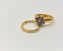 A 22ct gold band ring mounted with paste cluster together with a further gold band ring, 11.