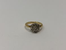 An 18ct gold diamond ring, 2.2g.