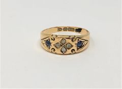 An antique 15ct gold sapphire and diamond ring