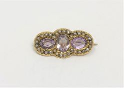 An antique 15ct gold amethyst and pearl brooch, 5.3g.