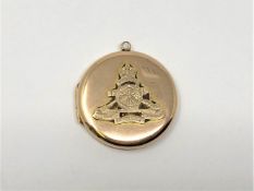 An antique yellow gold Royal military locket circa 1915, 6.6g.