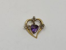 A 15ct gold heart shaped amethyst and pearl brooch