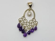 An unusual 14ct gold amethyst and pearl pendant