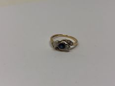 An antique 18ct gold sapphire and diamond ring, 2g.