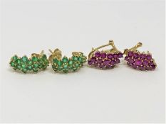 Two pairs of yellow gold earrings set with ruby and emerald, 5.9g.