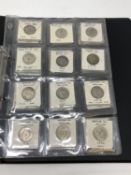 A collection of thirty George V one shilling coins including some un-circulated examples (30)