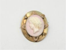 An antique pearl coral cameo brooch / pendant