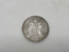 A 1974 50 Francs coin