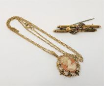 A 15ct gold ruby and pearl brooch, 3.3g, together with a yellow metal cameo pendant on chain.