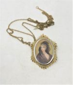 A hand finished portrait miniature pendant mounted in two tone metal with 18ct gold bale,