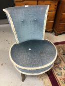 A blue buttoned bedroom chair