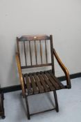 An antique beech folding chair