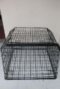 A large metal dog cage