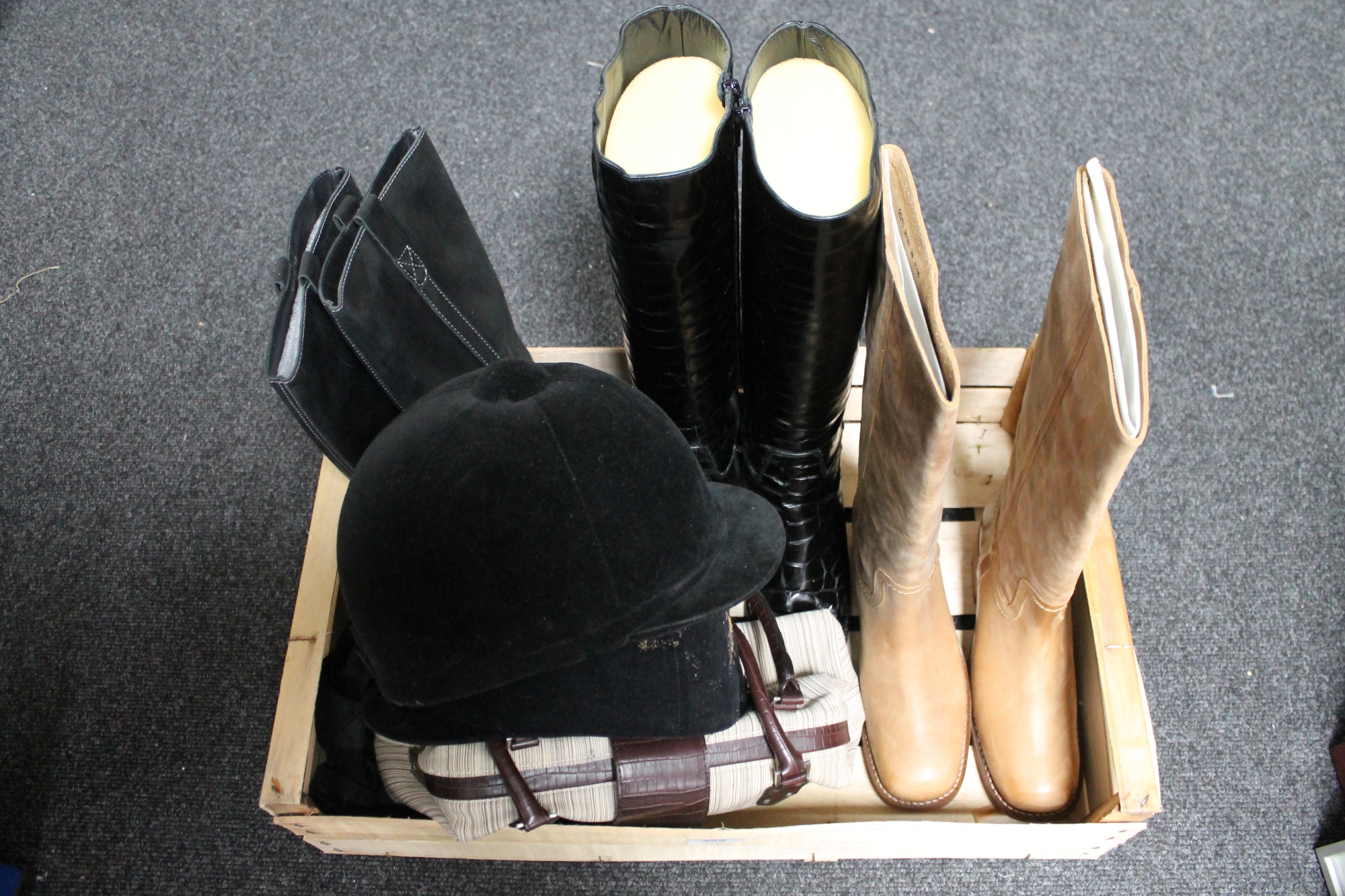 A box of two riding hats, lady's boots,