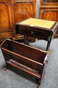 A reproduction mahogany occasional table and a magazine rack
