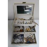 A box of costume jewellery, dress rings etc.