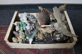 A collection of owl and animal ornaments,