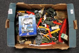 A box of die cast model vehicles,