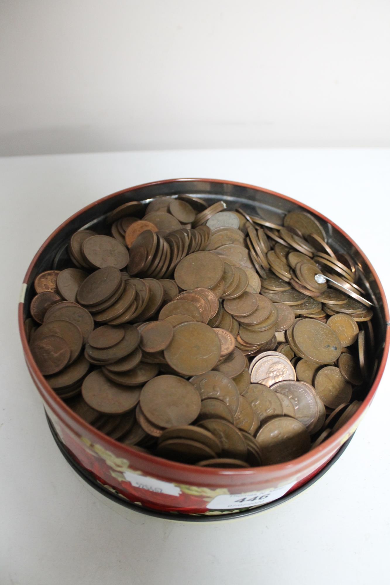 A large tin of coins