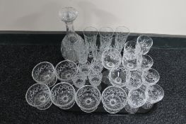 A tray of cut crystal decanter and glass