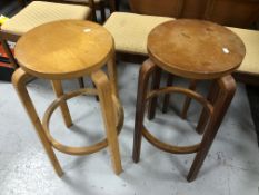 Two beech wood circular stools