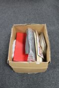 A box of albums and files of stamps,