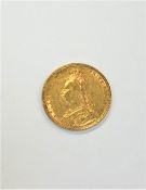 A Victorian full sovereign 1889