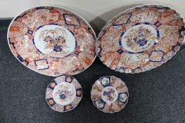 A nineteenth century Imari charger, together with further Japanese plaques/plates.