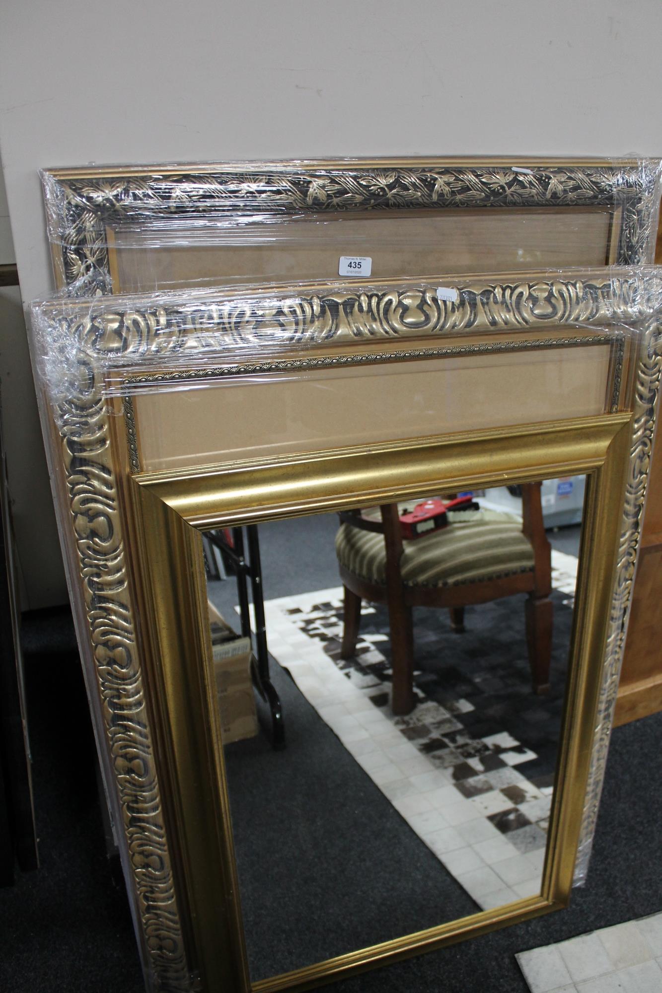 Two decorative gilt picture frames and a contemporary mirror