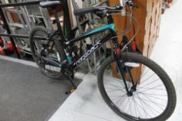 A Ridgeback MX2 mountain bike together with a bike lock