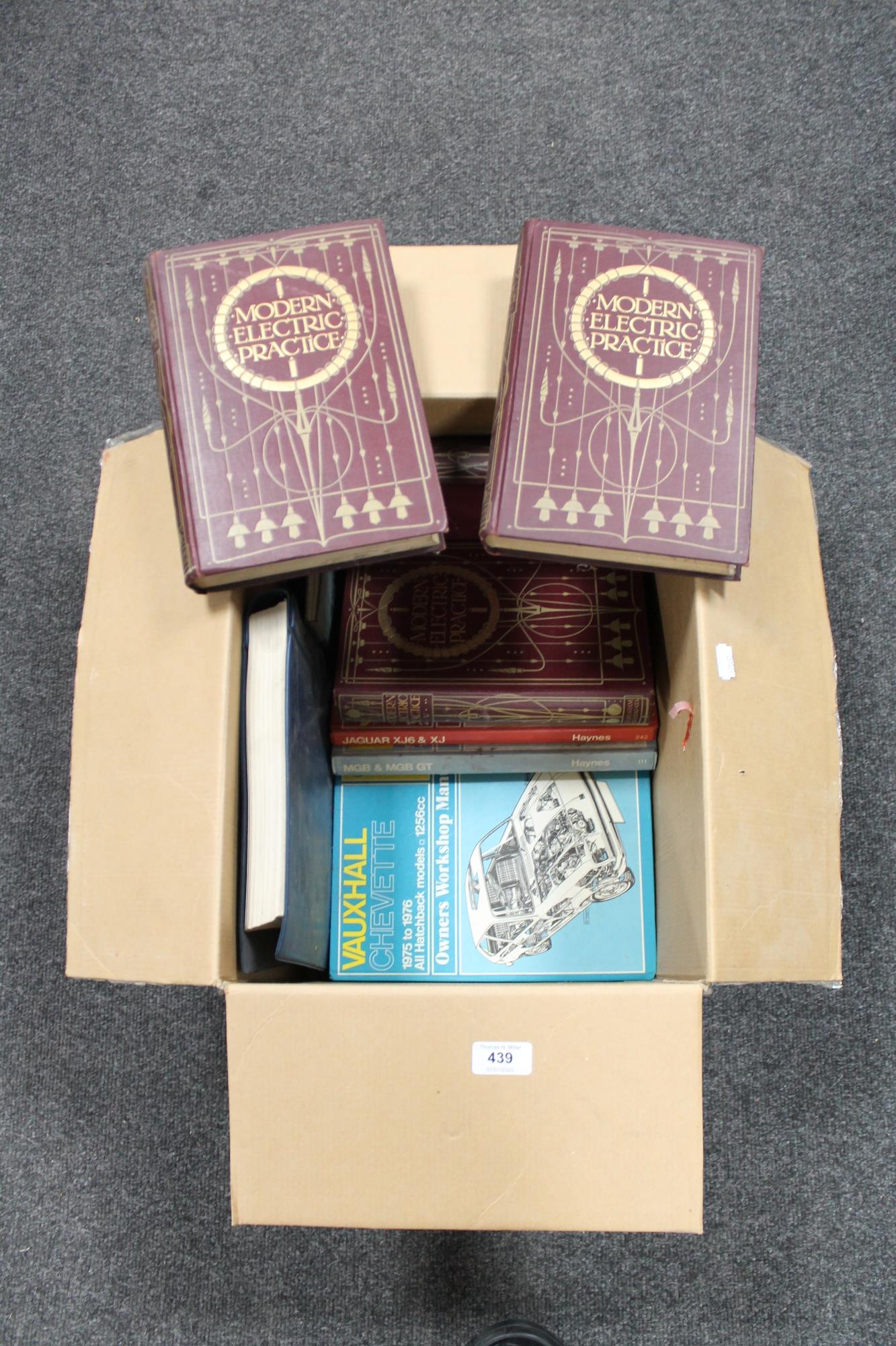 A box of books including Modern Electric Practice volumes,