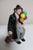 A Royal Doulton figure - The Balloon man HN 1954