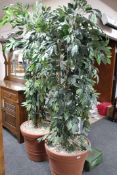 A pair of large artificial trees in pots (2)