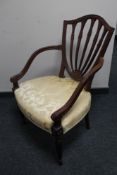 A reproduction Regency style carved mahogany armchair