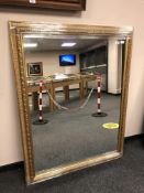 A golden framed mirror