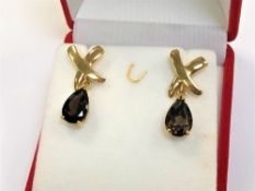 A pair of 10ct gold brown quartz drop earrings CONDITION REPORT: 4.